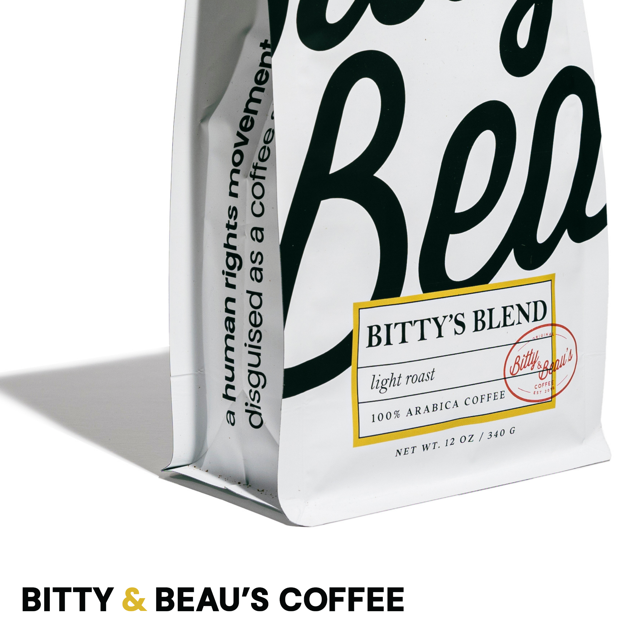 Bag of Bitty’s Blend light roast coffee from Bitty & Beau’s Coffee, featuring the slogan “a human rights movement disguised as a coffee shop.”